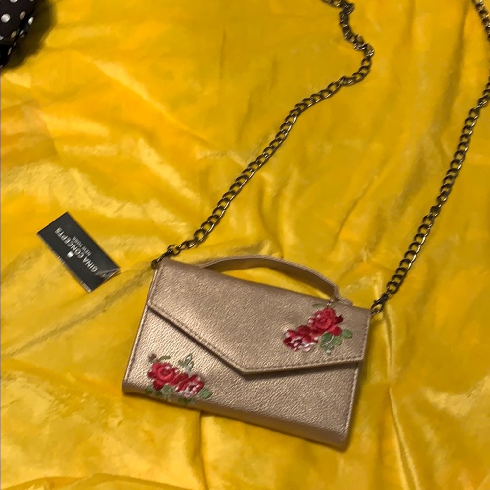 cross bag with floral patches